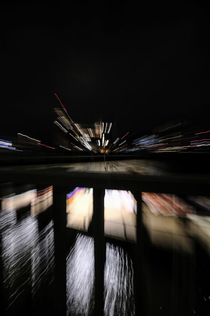 A blurry photo of a city at night